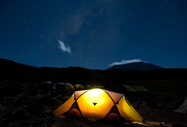 Climber sin tent on Mount Kilimanjaro